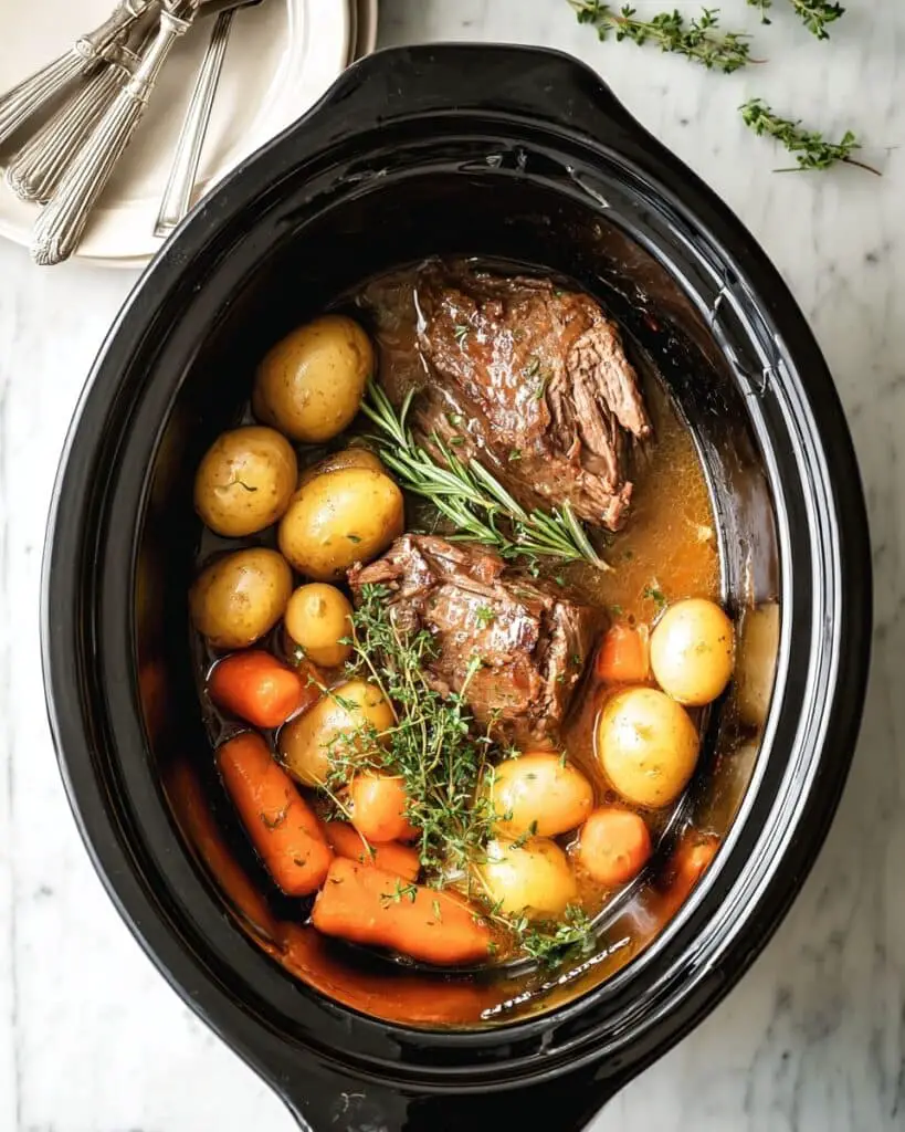 Slow Cooker Pot Roast with Carrots, Potatoes, and Savory Gravy Recipe