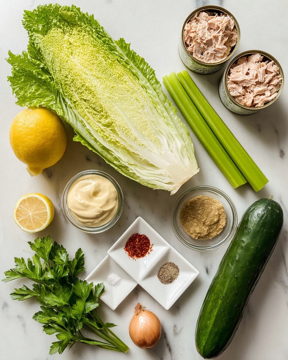 The image shows fresh ingredients arranged neatly on a white marbled surface. There is a large romaine lettuce leaf on the left with a light green and textured surface, two long light green celery stalks with a smooth texture placed next to it, and a whole dark green cucumber on the right. Near the top right, two open cans of light pink tuna are visible. In the center, there is a half lemon with a yellow rind and juicy interior, a small glass bowl of creamy mayonnaise, and another small glass bowl containing light brown mustard. Near the lemon, a small white square dish holds four different spices: red paprika, white salt, black pepper, and beige garlic powder. A small whole shallot with a golden-brown skin is placed near the celery. At the bottom center-left, a few sprigs of green parsley with broad leaves lie flat on the surface. The photo taken with an iphone --ar 4:5 --v 7