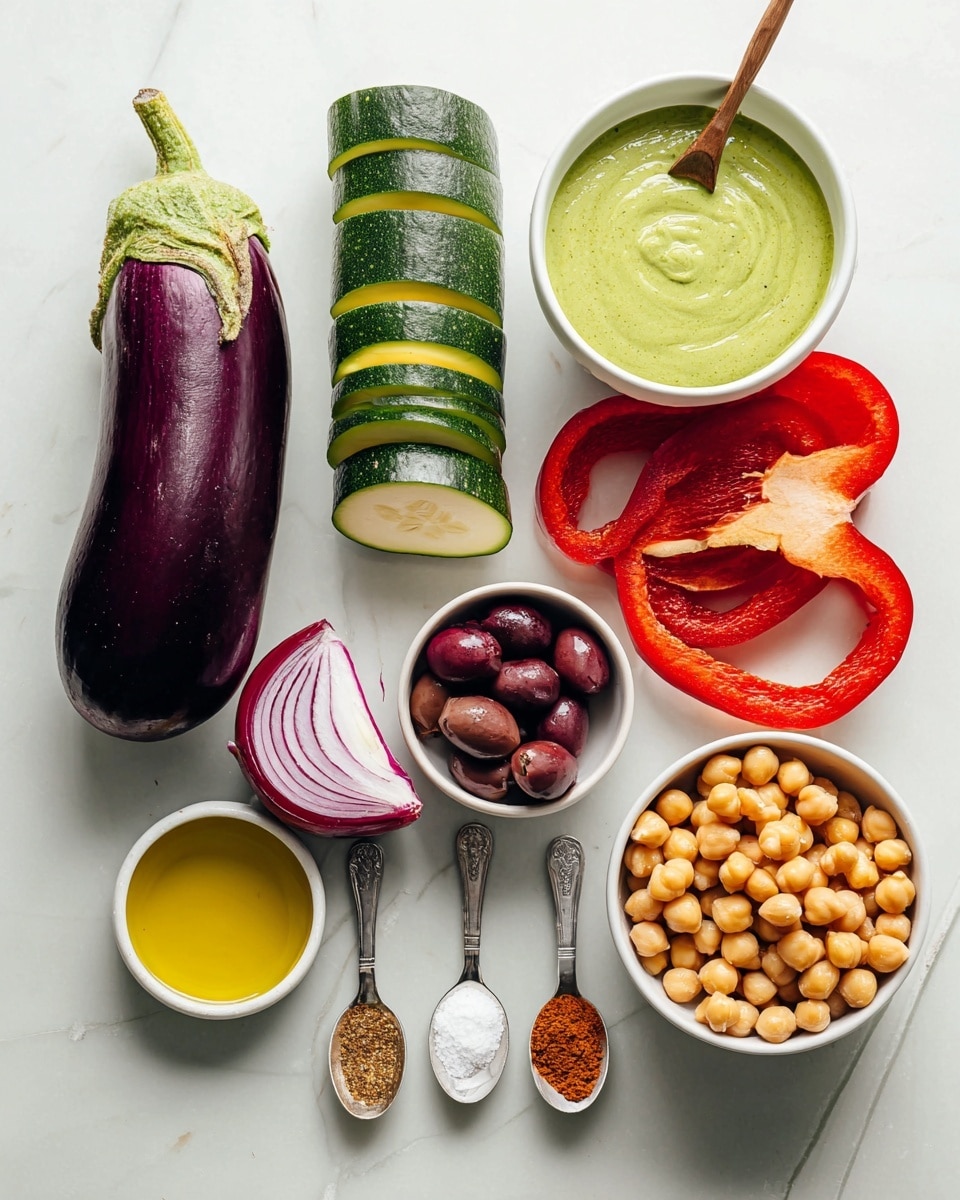 The image shows a collection of fresh and colorful ingredients arranged neatly on a white marbled surface. From left to right, there is a whole deep purple eggplant with a green stem, a dark green zucchini standing upright with several round slices stacked beside it, a half red onion with purple and white layers, and a half red bell pepper showing its white seeds and inner ribs. Next to these vegetables, there is a small white bowl filled with smooth green sauce, a white bowl with dark red sliced olives, and a larger white bowl filled with round beige chickpeas. Below, there are four small spoons filled with various spices and sea salt, and a small white bowl holding golden olive oil. All items are brightly lit, emphasizing their fresh textures and vibrant colors, photo taken with an iphone --ar 4:5 --v 7