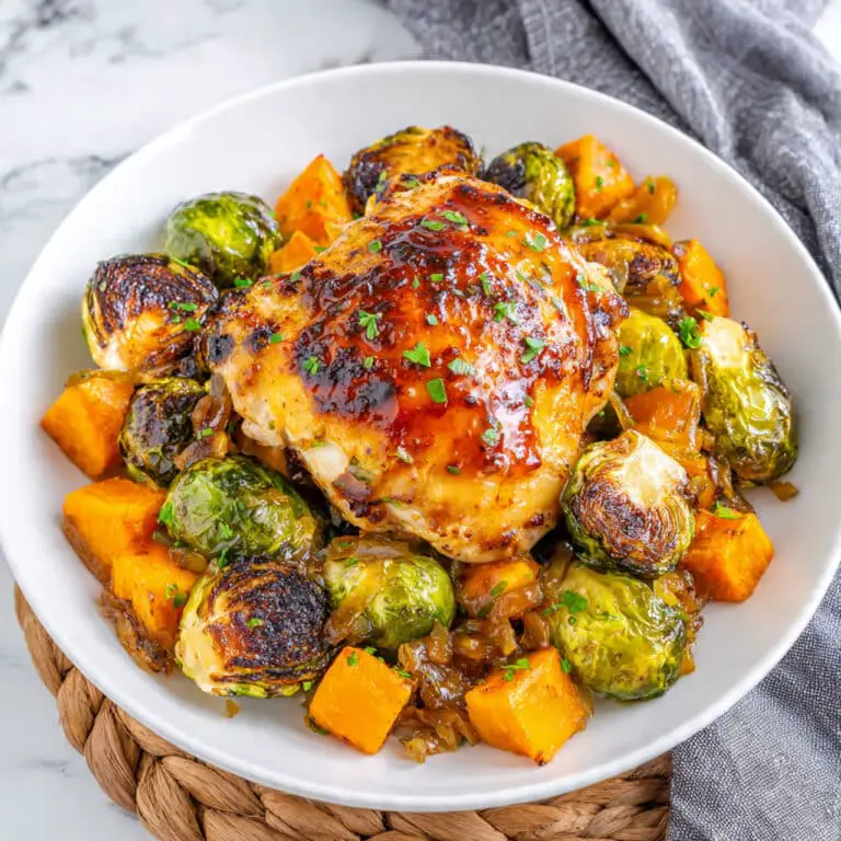 Sheet Pan Maple Dijon Chicken with Bacon, Brussels Sprouts, and Sweet Potatoes Recipe