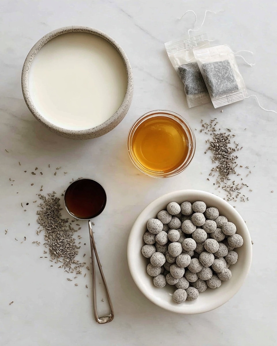 A top view of four items on a white marbled texture: a bowl filled with white milk placed at the upper left, two tea bags with gray tea leaves on the top right, a small glass container filled with golden honey in the center bottom, and a white bowl filled with round, grayish powdered balls on the right side. Grayish powdered balls are also scattered around the bowls and the surface. A metal measuring spoon with dark brown liquid rests on the bottom left side. Photo taken with an iphone --ar 4:5 --v 7
