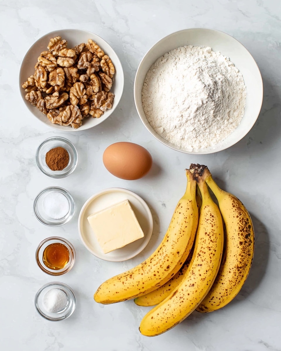 The image shows several ingredients arranged on a white marbled surface: three ripe yellow bananas with brown spots lying on the right side, a single brown egg in the center, a small square of light yellow butter next to it, a large white bowl filled with white flour at the top, a white bowl of walnut halves on the left, a white bowl of white sugar at the top right, and four small clear glass bowls containing cinnamon powder, salt, baking powder, and honey placed at the bottom left. Photo taken with an iphone --ar 4:5 --v 7