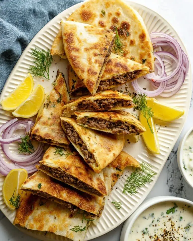 Arayes: Grilled Pita Sandwiches Filled with Spiced Ground Beef and Herbs Recipe