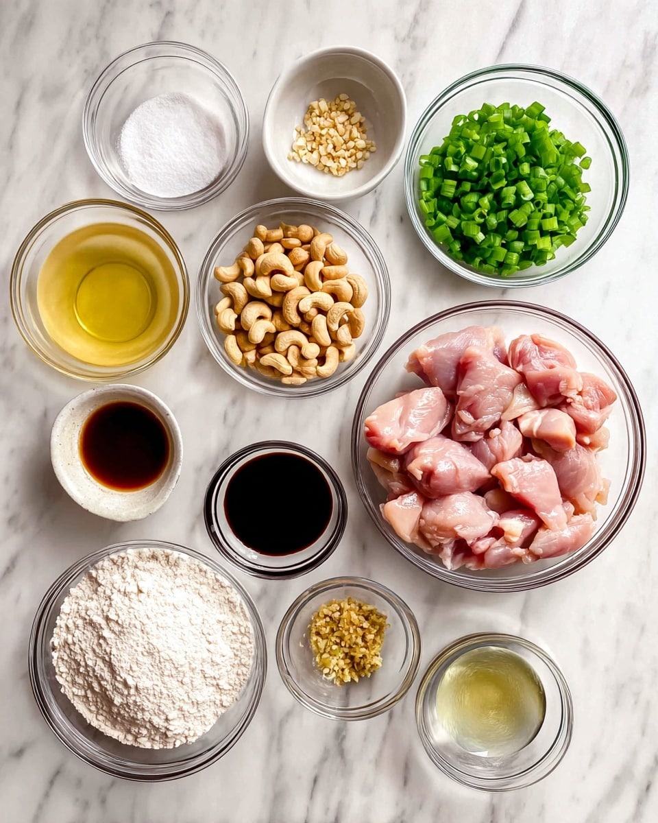 A white marbled surface holds ten clear round bowls arranged in rows, each containing different ingredients for cooking. The largest bowl on the right is filled with raw pink chicken pieces. Next to it, a bowl of bright green chopped scallions rests at the top right corner. In front of the chicken, a small bowl holds whole light brown cashew nuts. Below and slightly left is a bowl of white powdery cornstarch. Above and in the middle row, there are several small bowls with sauces and liquids: a large bowl of pale yellow liquid, a bowl with dark soy sauce, a small bowl of dark brown hoisin sauce, and two tiny bowls with minced garlic and minced ginger. A woman’s hand is not visible but implied to be nearby to assist with cooking. All bowls are on a white marbled surface. photo taken with an iphone --ar 4:5 --v 7