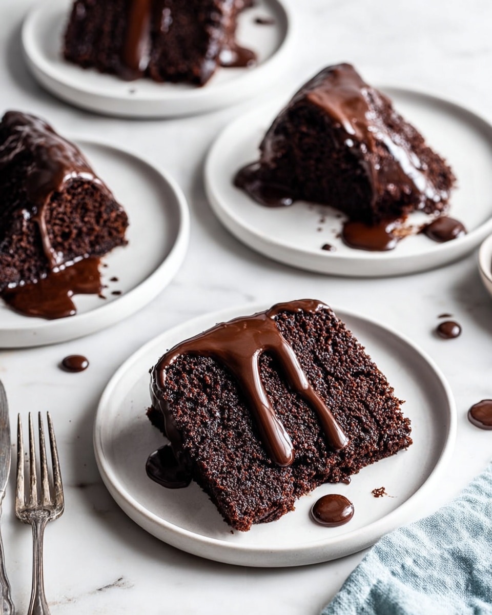 This image shows five slices of dark chocolate cake placed on small white plates, each slice having one layer of moist, rich chocolate cake. The top edges of the slices are covered with thick, glossy melted chocolate that drips down the sides, creating a shiny, smooth texture contrasting with the soft cake. Some melted chocolate drops are visible on the plates and the white marbled surface beneath. Two forks are placed next to the plates with dripping chocolate. The photo shows a light blue cloth in the lower right corner. photo taken with an iphone --ar 4:5 --v 7