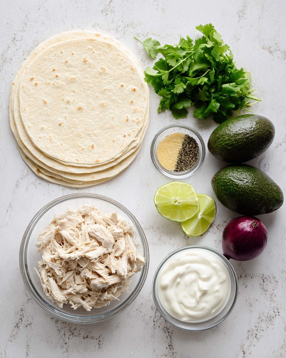 The image shows the ingredients for a chicken avocado wrap arranged on a white marbled surface. On the left, there are four folded soft tortillas in a neat stack. Moving right, a small bunch of fresh green cilantro sits next to two whole dark green avocados. Above them is a small clear bowl holding a mix of pale yellow and black spices, and next to it is a larger clear bowl filled with shredded pale chicken. Below the chicken bowl, there's a small clear bowl filled with thick white sour cream and a small bowl with two lime halves beside a whole dark purple onion. The colors are natural and fresh, with the textures ranging from smooth avocados and sour cream to rough shredded chicken and leafy cilantro. Photo taken with an iphone --ar 4:5 --v 7