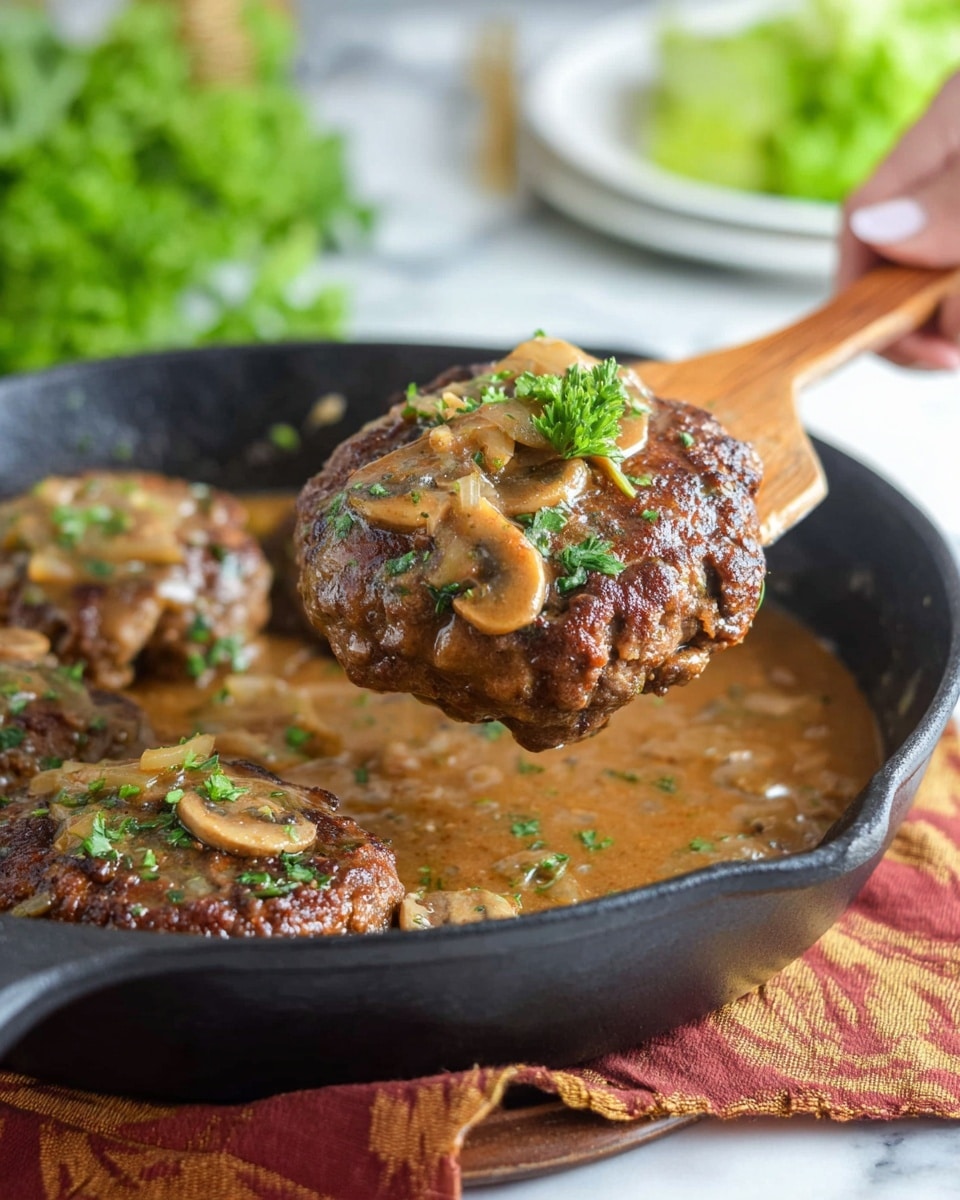 The image shows a dark brown cooked patty held by a woman's hand with a wooden spatula, covered with light brown gravy containing sliced onions and mushrooms, and sprinkled with green herbs on top. The patty is being lifted from a black pan filled with more gravy and patties. The background has blurred green lettuce and a white plate, all set on a white marbled surface with a wooden trivet under the pan. photo taken with an iphone --ar 4:5 --v 7