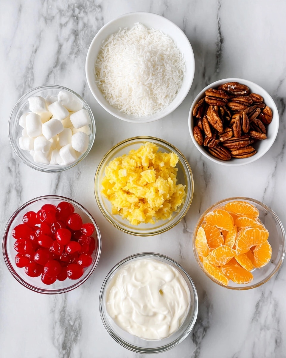 The image shows seven small bowls arranged on a white marbled surface. Starting from the top left, there is a white bowl filled with finely shredded white coconut, next to it on the right is a white bowl filled with dark brown pecan halves. Below these, to the left, is a clear glass bowl with small white marshmallows and beside it a small white bowl filled with plain white yogurt. In the center is a clear glass bowl holding crushed yellow pineapple. To the bottom left is a white bowl with bright red maraschino cherries, and at the bottom right, there is a small clear glass bowl filled with segmented bright orange mandarin slices. Everything looks fresh and ready for mixing. photo taken with an iphone --ar 4:5 --v 7
