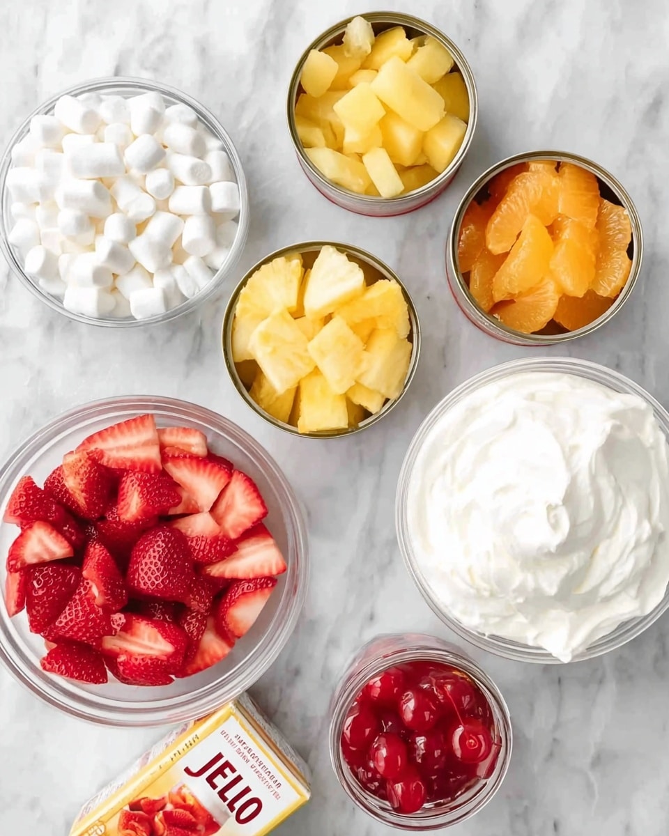 The image shows several clear bowls and cans on a white marbled surface, arranged in a loose circle. There is one bowl filled with small white marshmallows, another bowl piled with bright red sliced strawberries at the bottom left, and a larger bowl holding thick white whipped cream or frosting near the center right. Around these are four open cans containing bright yellow pineapple chunks, a mix of yellow pears and red cherries, orange mandarin slices, and a small jar filled with shiny red cherries. There is also a small box of JELL-O pudding mix placed in front, near the strawberries. The overall scene is colorful with white, red, yellow, and orange tones clearly visible. Photo taken with an iphone --ar 4:5 --v 7