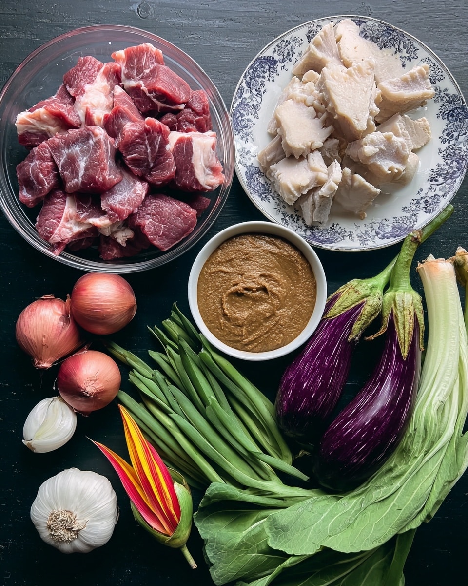 The image shows a dark surface with various fresh ingredients arranged neatly. On the bottom left, there are three small round red onions and one round white garlic bulb. Above them, there is a clear glass bowl filled with several pieces of raw red meat with white fat, cut into chunks. To the right of the meat, there is a white bowl containing a smooth brown paste. Above it, a plate with white base and dark blue floral border holds light beige pieces of raw tripe with a rough texture. On the right side, there is a long purple eggplant next to a red and yellow banana flower. Above these, there are long green beans curved in a loop. At the bottom right corner, there is a bunch of fresh green bok choy with white stalks and leafy tops. Photo taken with an iphone --ar 4:5 --v 7