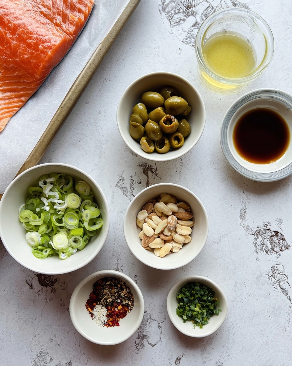 The image shows several small white bowls arranged neatly on a white marbled surface. One bowl is filled with chopped green onions, another with sliced green olives, and a third with sliced almonds. There is a small bowl containing a mixture of red, black, and white spices, and another bowl with freshly minced garlic and chopped green herbs. A small clear bowl contains a light yellow liquid, likely lemon juice, while another holds a dark amber liquid, possibly soy sauce. To the left, a tray with a piece of raw salmon on white parchment paper is partially visible. Photo taken with an iphone --ar 4:5 --v 7