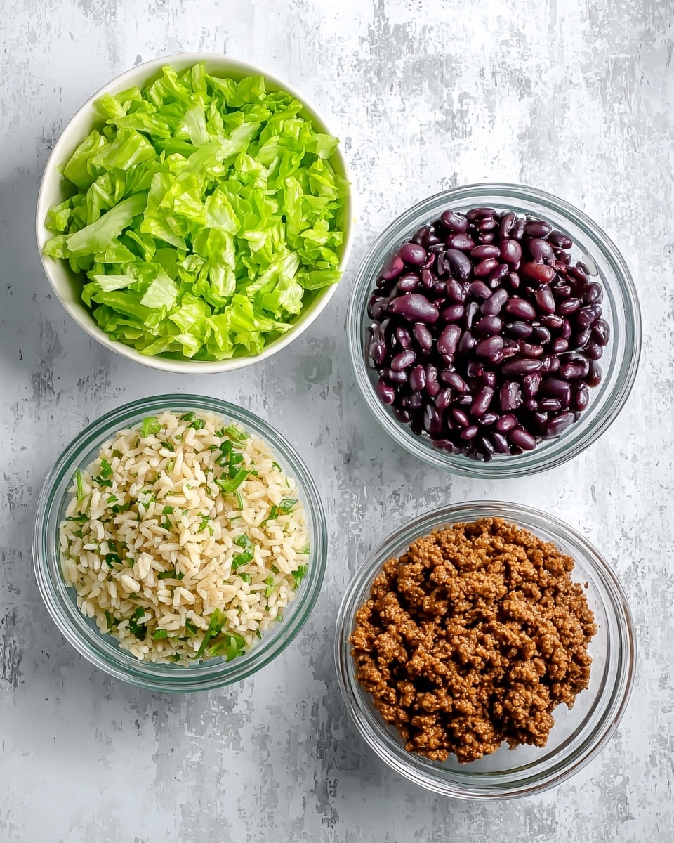The image shows four separate containers placed on a white marbled surface. The top left container is a white bowl filled with bright green chopped lettuce pieces with a crisp texture. To the right of it is a clear container filled with shiny, dark purple-black beans that have a smooth and glossy look. Below the beans is another clear container holding a brown, crumbly taco meat mixture with visible small chunks and a slightly moist texture. To the left of the taco meat, there is a clear container filled with cooked rice mixed with green herbs, giving it a light beige and green speckled look. The containers are arranged in a rough square shape. Photo taken with an iphone --ar 4:5 --v 7