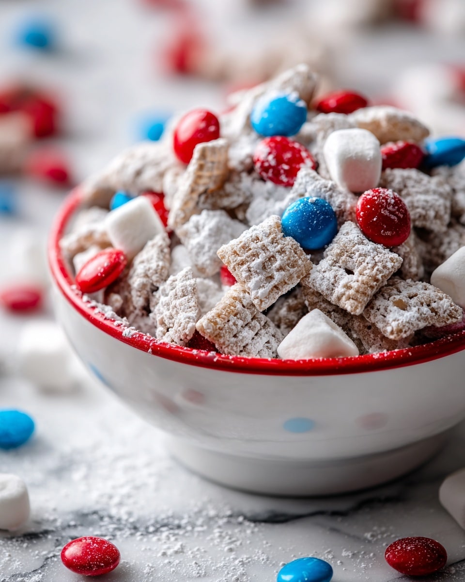 A close-up view of a snack mix in a white bowl with a red edge, filled with multiple layers of small square cereal pieces covered in white powdered sugar, bright red, blue, and white candy-coated chocolates scattered evenly on top and among the cereal pieces. The bowl sits on a white marbled surface with some candy-coated chocolates spilled around it. The textures show the powdery cereal, smooth candies, and soft marshmallows in the mix. photo taken with an iphone --ar 4:5 --v 7