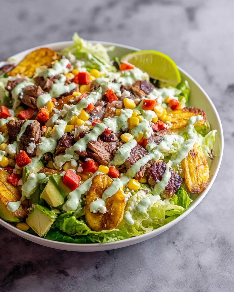 A white bowl is filled with a fresh salad layered from bottom to top. The base layer is made of light green leafy lettuce. On top, there are pieces of grilled meat with a slightly browned, seared texture, golden plantain slices with a crispy finish, and yellow corn kernels. Scattered over these are small cubes of red chips and white crumbly cheese. There are also slices of light green avocado near the edge and small yellow tomato halves spread around. The whole salad is drizzled with a creamy light green dressing and a wedge of lime is placed on the top side. The bowl sits on a white marbled surface. Photo taken with an iphone --ar 4:5 --v 7