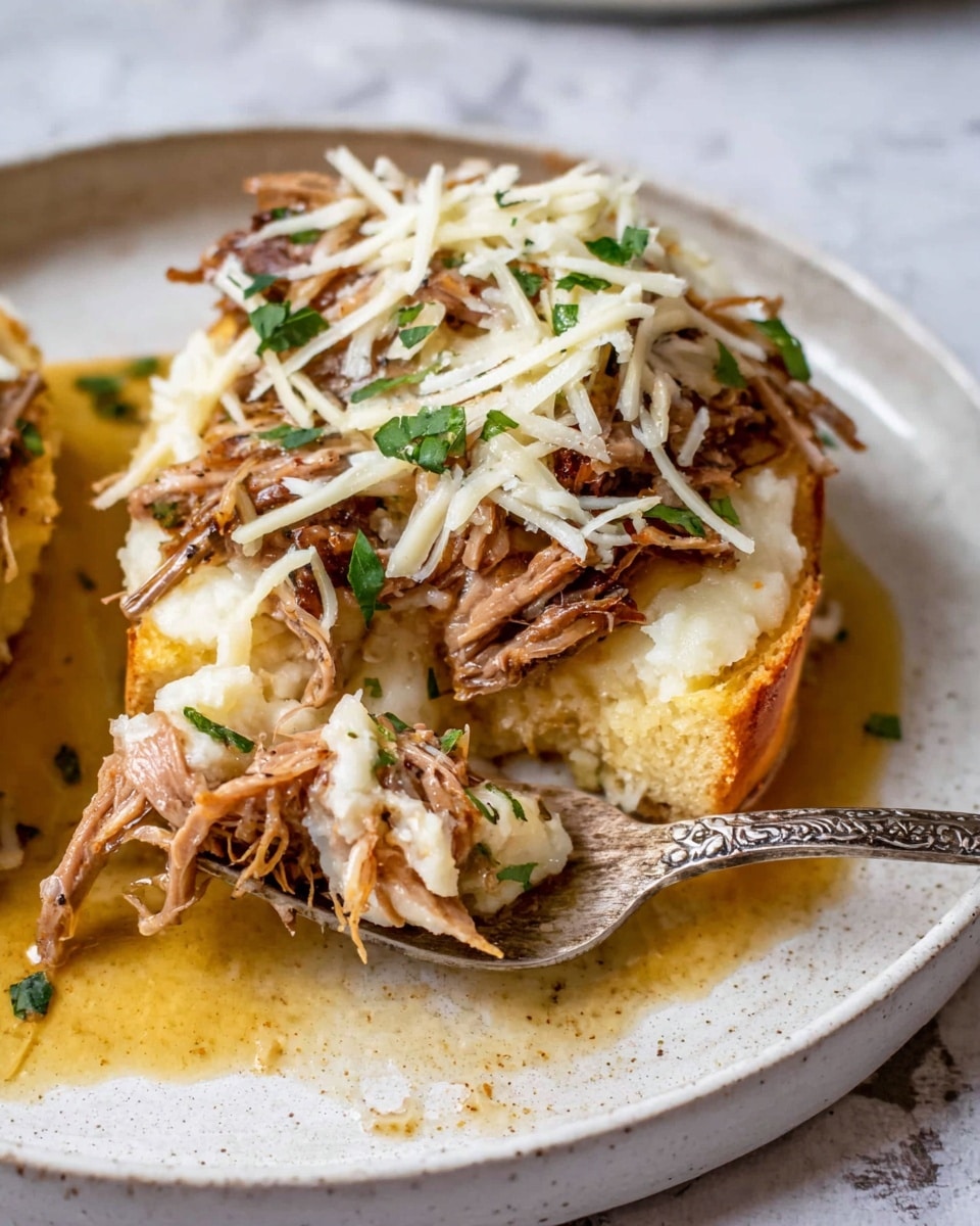 The dish shows a close-up of open-faced food on a white plate with a white marbled texture background. The base layer is a piece of golden toasted bread. On top is a thick creamy layer of pale mashed potatoes, smooth with a little texture. The next layer features shredded brown cooked meat, slightly moist and fibrous. Thin strands of shredded white cheese are sprinkled on top, melting slightly into the meat. Small pieces of fresh green herbs are scattered over everything. A vintage silver fork with an ornate handle holds a bite with all layers from the plate. There is a golden sauce around the food pooling on the plate's surface. photo taken with an iphone --ar 4:5 --v 7