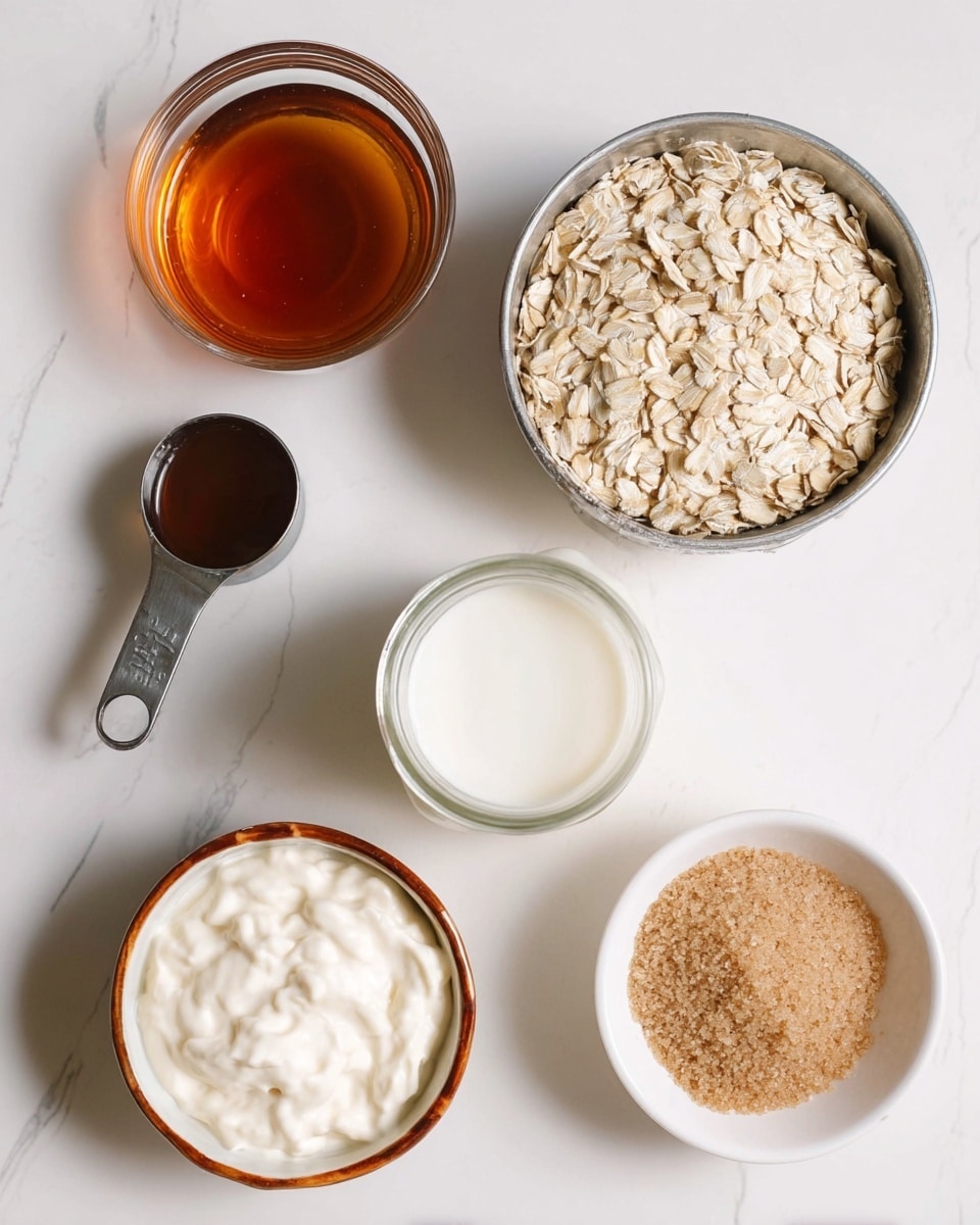 The image shows six ingredients placed on a white marbled surface. Starting from the top left, there is a transparent glass bowl filled with dark amber liquid. Below it, a metal measuring cup holds light beige rolled oats. In the center is a small mason jar filled with white liquid, and to its right is a metal measuring cup fully filled with white creamy yogurt. At the bottom left, there is a small round ceramic bowl with a brown rim, containing a medium brown syrup or sauce. At the bottom right, a white bowl holds light brown soft sugar. All containers are arranged neatly with clear visibility of textures and colors. Photo taken with an iphone --ar 4:5 --v 7
