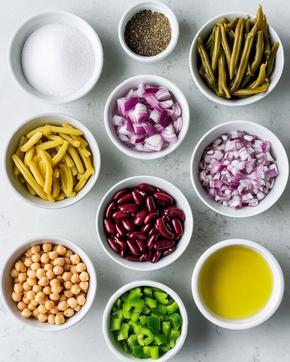 The image shows ten small white bowls arranged on a white marbled surface, each filled with different ingredients. From top left to right, a bowl holds white granulated sugar, next to it is a bowl with ground black pepper, and below is a bowl with chopped red onions in white and purple colors. To the left center, a bowl contains yellow wax beans, next to it green beans, and below them, a bowl with dark red kidney beans. Towards the bottom left, a bowl is filled with round, light beige chickpeas, adjacent to it is a bowl with bright green chopped bell peppers. In the bottom right corner, there are two bowls: one filled with light brown vinegar and the other with pale yellow oil. All bowls are neatly placed, showing a variety of textures and colors. Photo taken with an iphone --ar 4:5 --v 7