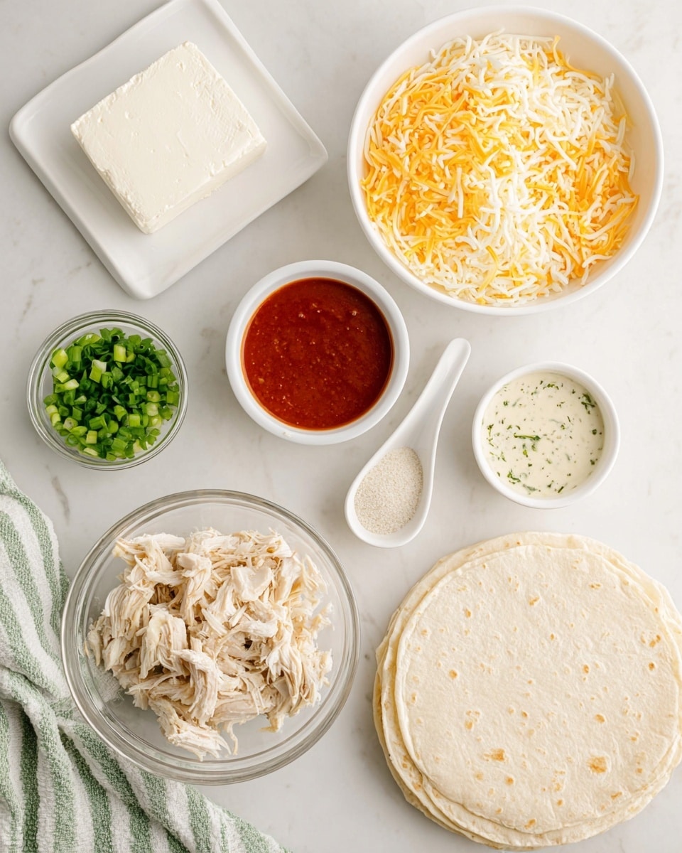 A top-down view shows a white marbled surface with several white bowls and plates arranged neatly. There is a rectangular block of white cream cheese on a small white plate at the top left. Below it is a white bowl filled with shredded yellow and white cheese. To the right of the cheese are two white bowls, one with red sauce and the other with a lighter creamy sauce with herbs. A small white spoon-shaped dish contains a mix of white and light tan powders. A white bowl near the bottom center holds chopped green onions. At the bottom left, a clear glass bowl is filled with shredded cooked chicken. On the right side of the image, a stack of plain beige tortillas lies flat on the surface. A green and white striped cloth peeks out from the bottom left corner. photo taken with an iphone --ar 4:5 --v 7