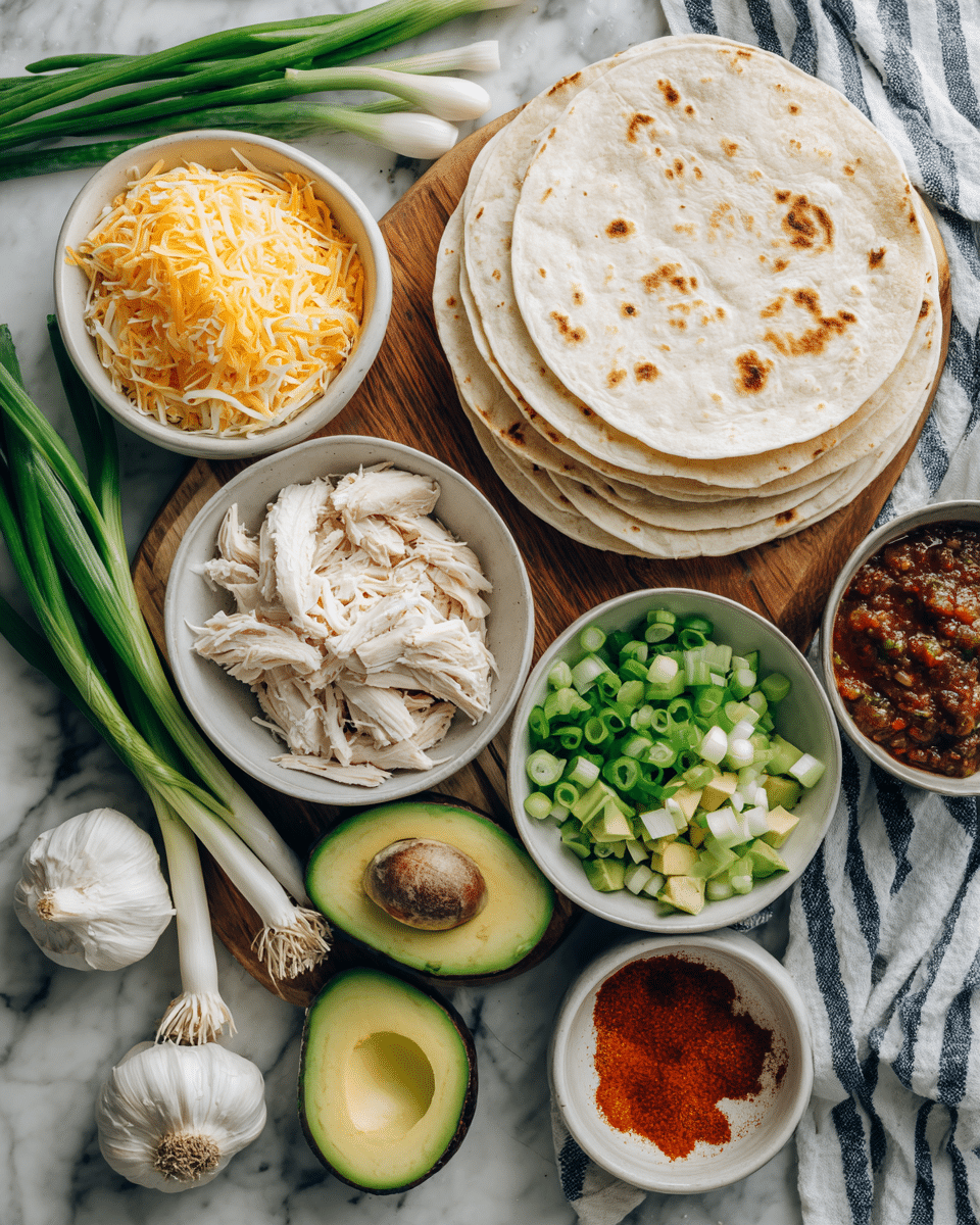 The image shows a white marbled surface with a wooden board holding several white bowls and plates filled with fresh ingredients. On the top right, there is a stack of white tortillas with light brown spots. Next to the tortillas, a bowl contains shredded yellow and white cheese with a fine, soft texture. In the center, a bowl is filled with thinly sliced green onions showing rings of bright green and pale green. Below it, another bowl contains diced avocado pieces in light and dark green shades. On the left side of the board, there is a halved avocado with a dark brown pit and green flesh. In the bottom left corner, a white bowl holds shredded white chicken pieces with a soft texture. Two whole green onions with white bulbs and long green stalks lie diagonally on the marbled surface above the board. A small white bowl with bright orange-red spice powder is placed near the green onions. Partly visible at the bottom right is a bowl with chunky dark red salsa, and near it, two bulbs of garlic with papery white skin rest on the marbled surface with a blue and white striped cloth underneath. Photo taken with an iphone --ar 4:5 --v 7