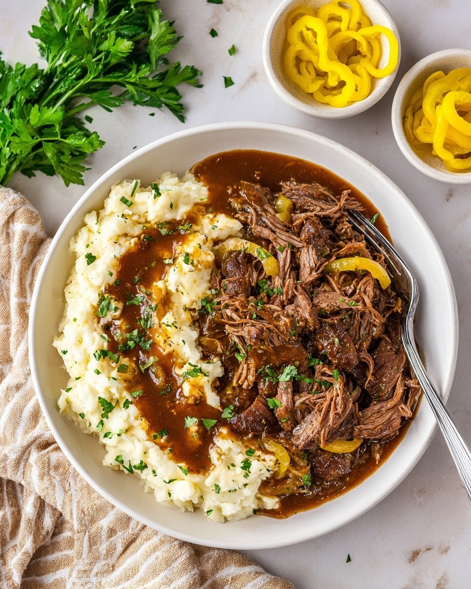 A white bowl holds two main layers: on one side, there is a thick, creamy layer of mashed potatoes topped with brown gravy and small green parsley pieces scattered over it. On the other side, there is a layer of tender, shredded brown beef mixed with cooked yellow pepper rings and bits of onions, also garnished with green parsley. A silver fork rests on the edge of the bowl. Nearby, a small white bowl with bright yellow pepper slices sits on a white marbled surface, along with fresh green parsley and a beige-striped cloth napkin. Photo taken with an iphone --ar 4:5 --v 7