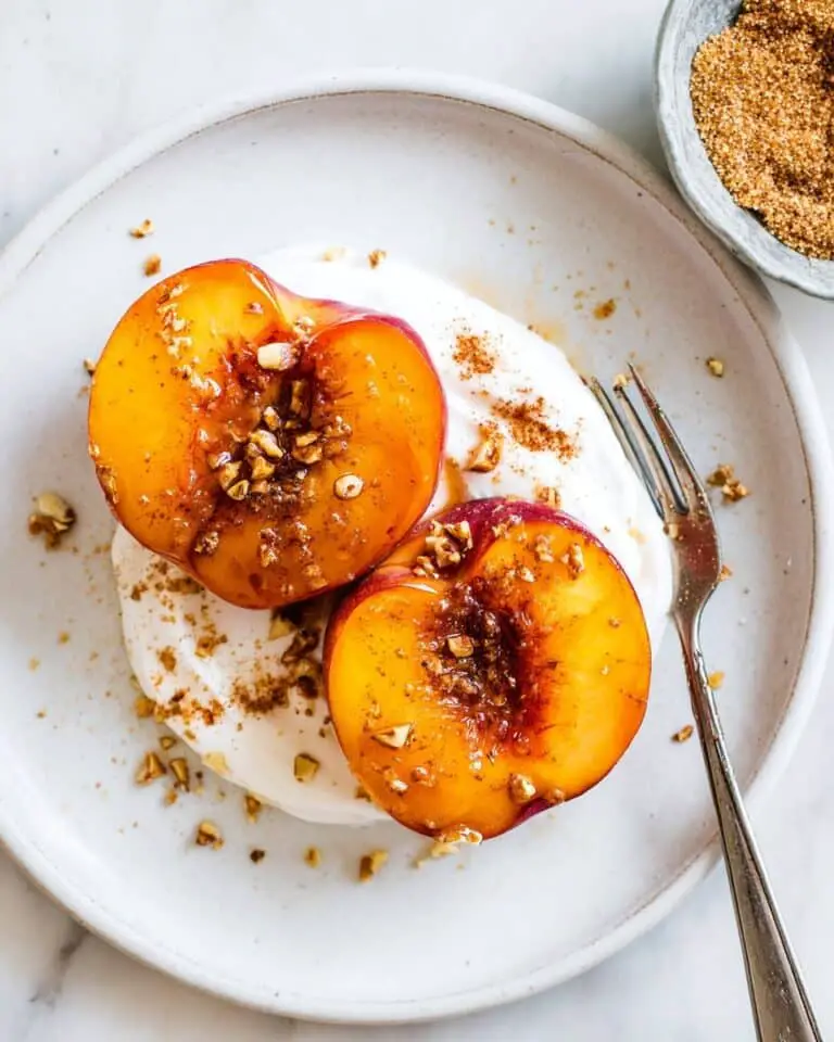 Air Fryer Peaches with Cinnamon, Nuts, and Whipped Topping Recipe