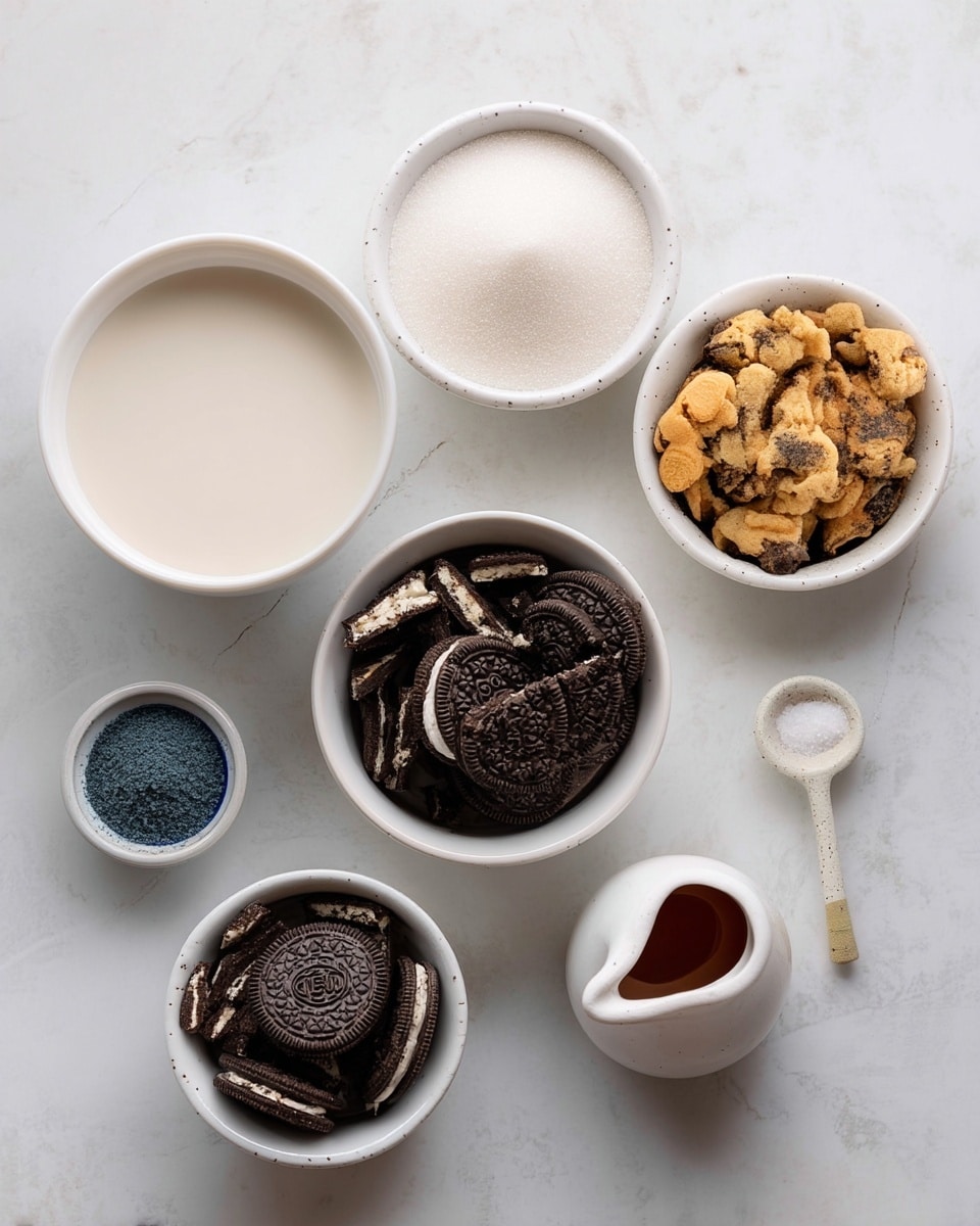 A top view of six small white dishes arranged on a white marbled surface, each containing a different ingredient. The largest bowl near the center holds fine white sugar. To its left is a bowl filled with smooth, creamy coconut milk. Above the sugar bowl is a dish with uneven, light brown broken chocolate chip cookies showing dark chocolate chunks. Below the sugar is a bowl packed with roughly broken black and white Oreo cookies. To the left of the Oreo bowl is a small container holding bright blue spirulina powder. On the right side, a tiny white spoon contains a small amount of white salt. A tiny white pitcher with a hint of dark amber vanilla extract peeks in from the bottom right corner. The composition is clean and neatly spaced, with soft natural lighting. photo taken with an iphone --ar 4:5 --v 7