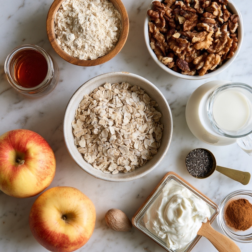 Top view of ingredients laid out on a white marbled surface, featuring one medium bowl filled with light beige gluten free oats in the center. Around it, clockwise: a small glass jar with amber maple syrup, two whole yellow-red apples, a wooden bowl with off-white protein powder, a white bowl filled with dark brown chopped walnuts, a clear glass jug with white milk, a small brass scoop holding black chia seeds, a wooden bowl with creamy white Greek yogurt, a square glass jar and a wooden spoon holding light brown nutmeg, and another small glass jar with cinnamon powder. Photo taken with an iphone --ar 4:5 --v 7