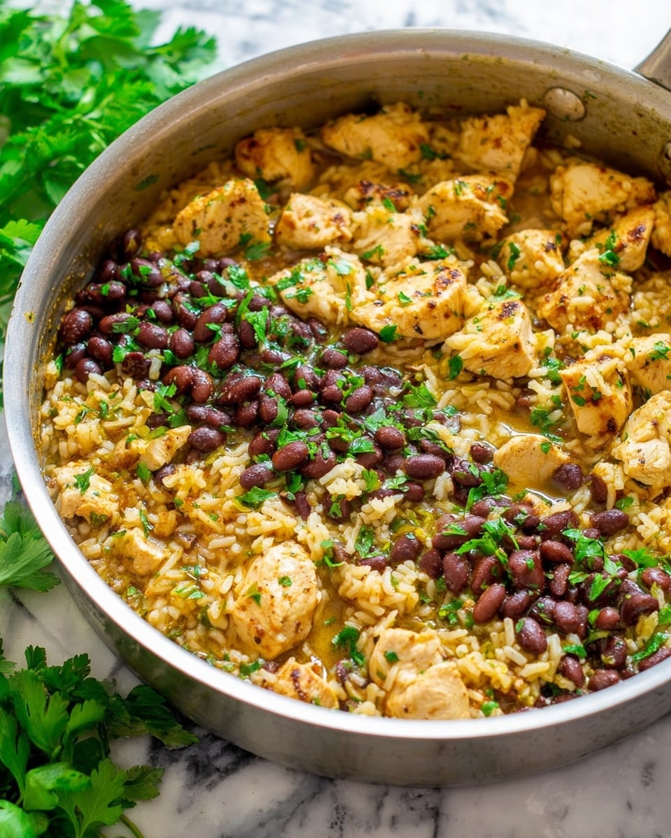 A close-up view of a large white pot filled with a single-layer dish made of chunky pieces of cooked chicken mixed with cooked rice and small dark red beans, all coated in a thick yellowish sauce with herbs and spices. The dish is sprinkled with bright green chopped cilantro, adding a fresh contrast to the warm colors of the chicken, beans, and rice. The pot sits on a white marbled surface with a silver spoon resting inside. Photo taken with an iphone --ar 4:5 --v 7