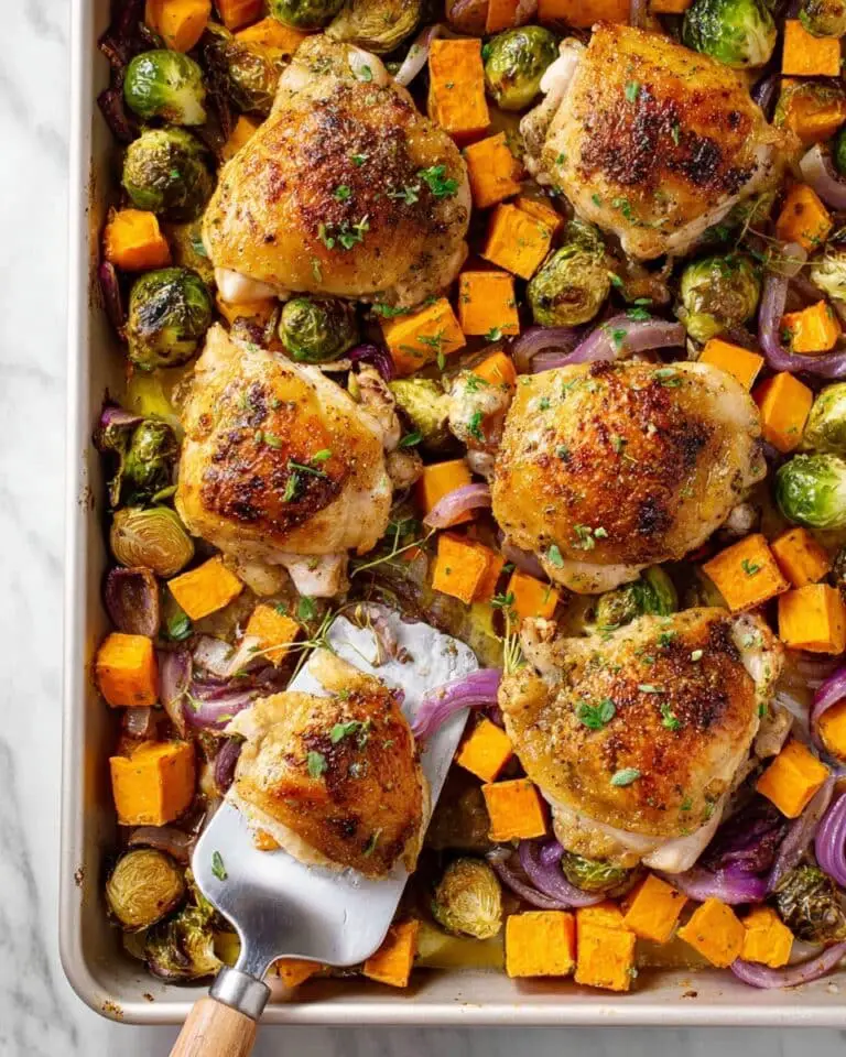 Sheet Pan Chicken Thighs with Roasted Butternut Squash, Brussels Sprouts, and Red Onion Recipe