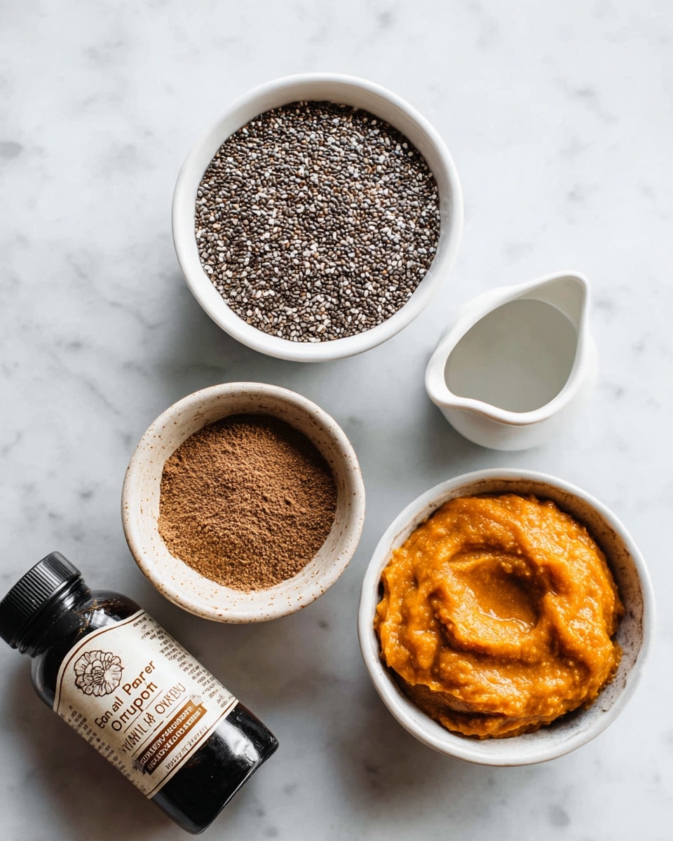 The image shows four white ceramic bowls placed on a white marbled surface. The top left bowl is filled with small black and white chia seeds. The top right bowl contains a thick orange puree with a slightly textured surface. Below these, a smaller bowl in the center holds finely ground brown powder. To the right, a small white pitcher is partially visible, containing a dark liquid. In the bottom left corner, a black bottle of pure bourbon vanilla extract lies on its side with a white and brown label showing text. Photo taken with an iphone --ar 4:5 --v 7